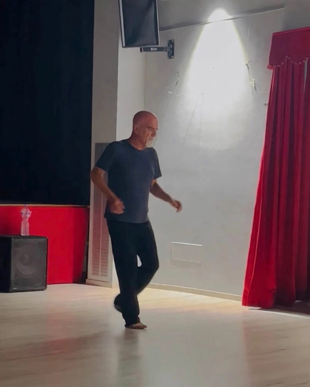 Michael A. Carson performing a movement improvisation in a studio in San Giustino, Italy, in 2025